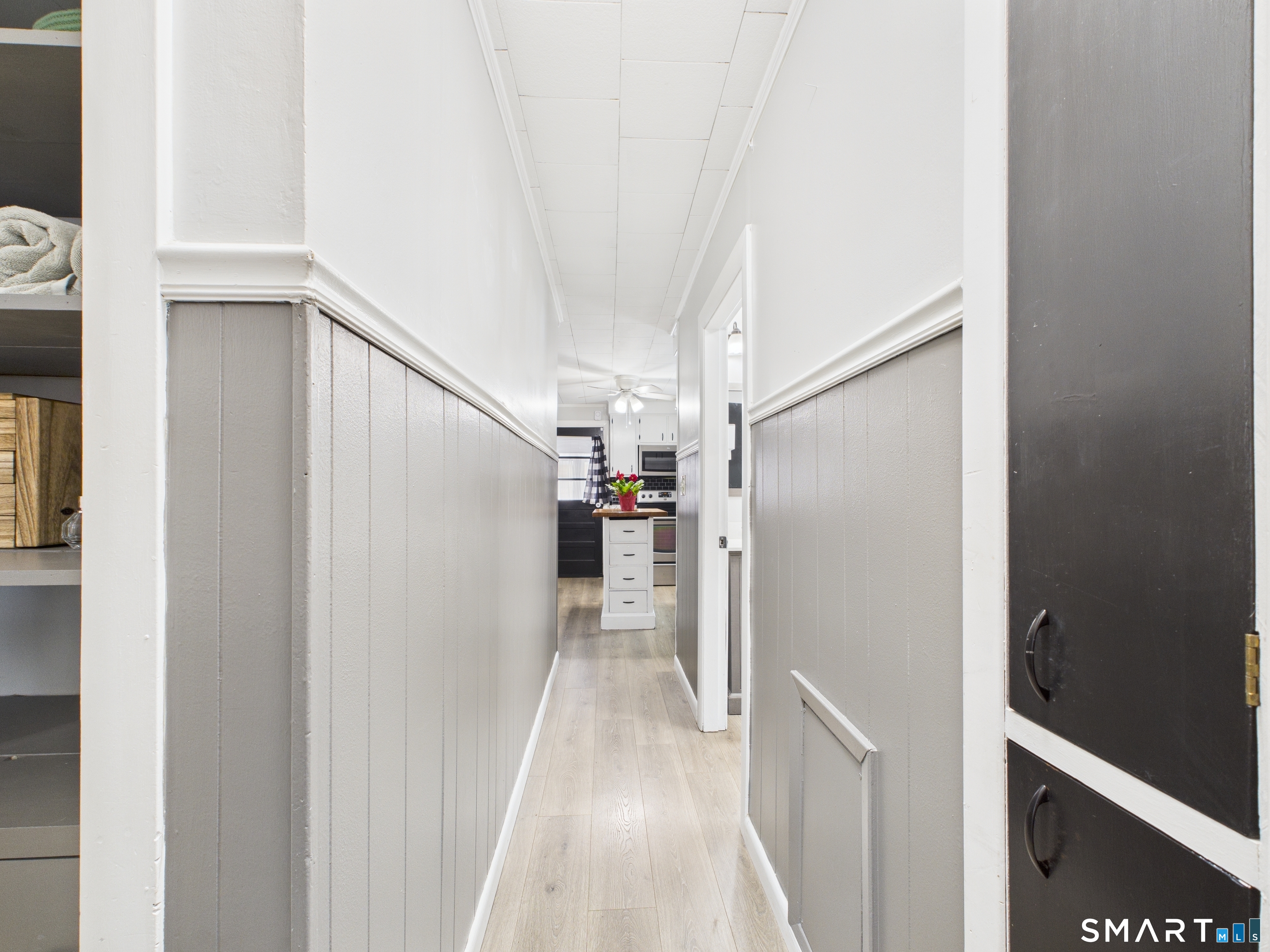 10 1st Street Thompson, CT 06255 - Photo 11 of 28 a view of a hallway with wooden floor
