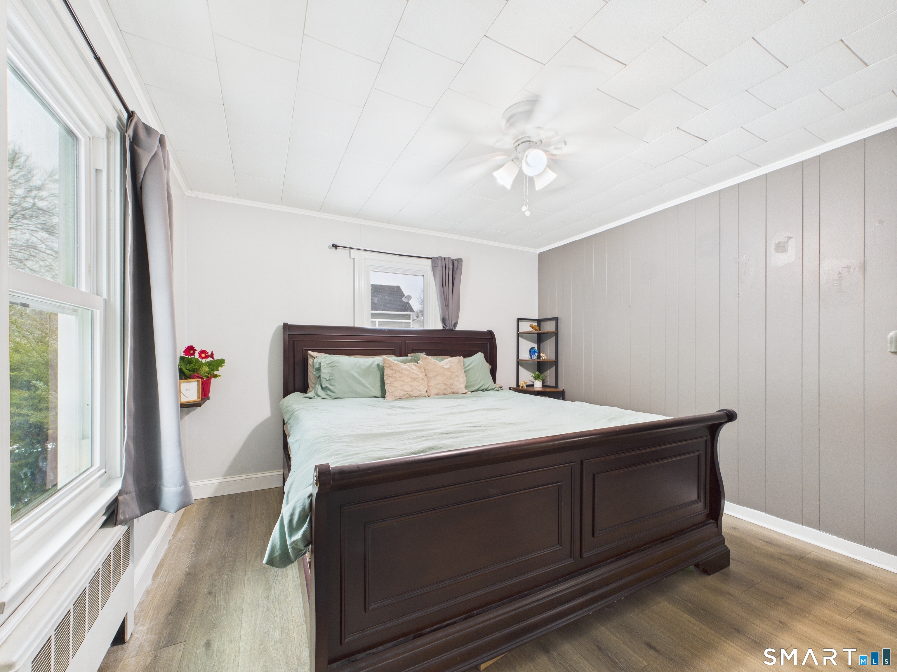 10 1st Street Thompson, CT 06255 - Photo 14 of 28 a bedroom with a bed and a large window