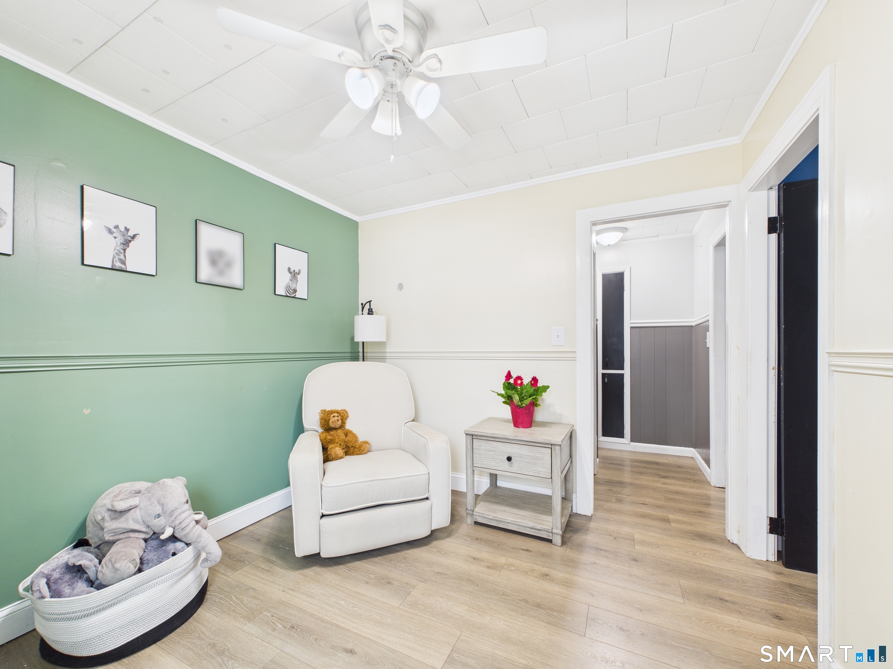 10 1st Street Thompson, CT 06255 - Photo 19 of 28 a living room with furniture and a wooden floor