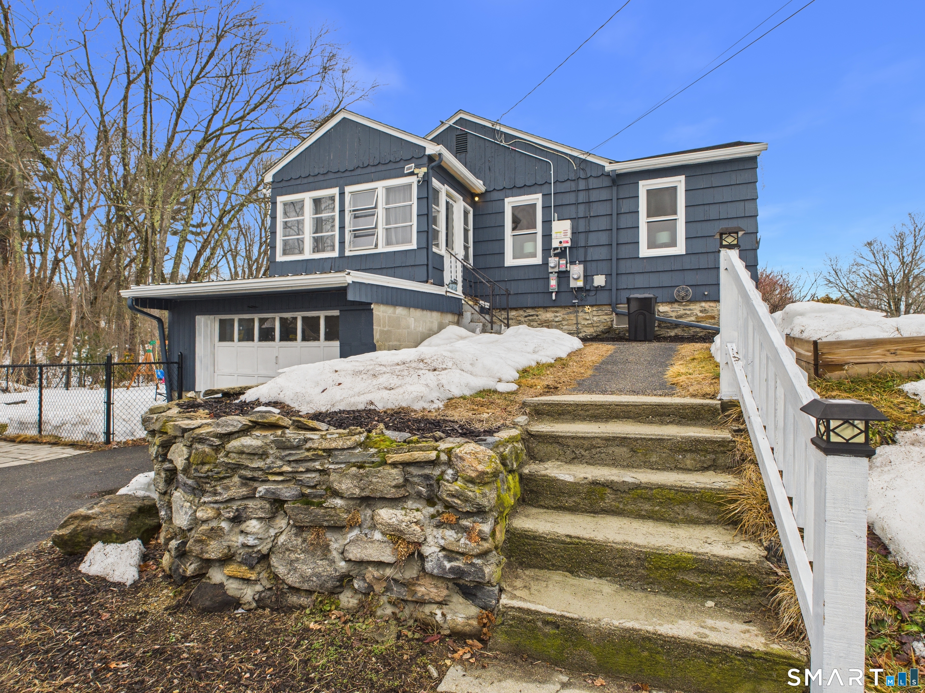 10 1st Street Thompson, CT 06255 - Photo 3 of 28 a front view of a house with a yard