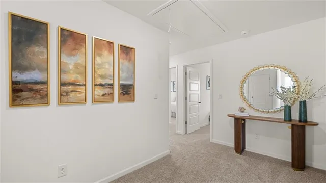 a view of a livingroom with furniture