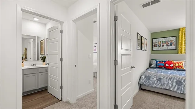 a bedroom with a bed and a cabinets