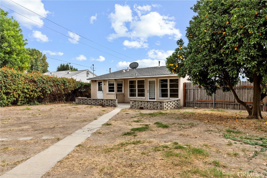 121 Shrode Avenue Monrovia, CA 91016 - Photo 22 of 23 a front view of a house with a garden