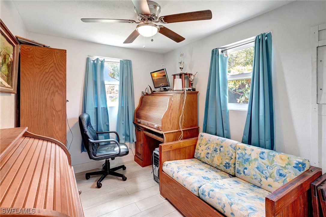 2153 Twin Brooks Road North Fort Myers, FL 33917 - Photo 21 of 31 a living room with furniture and a window