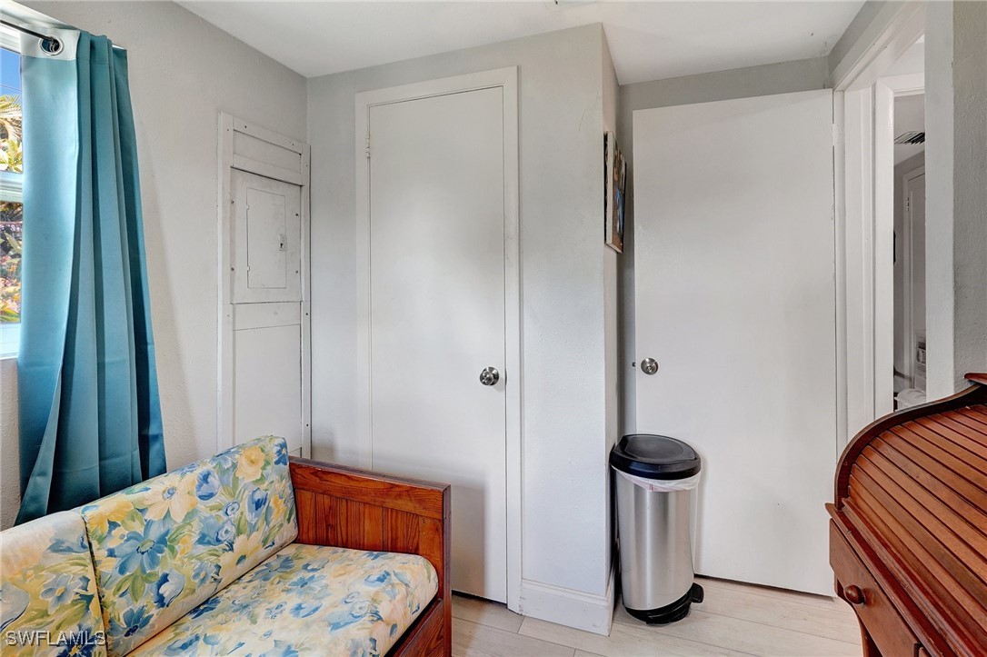 2153 Twin Brooks Road North Fort Myers, FL 33917 - Photo 22 of 31 a bedroom with a bed and a mirror