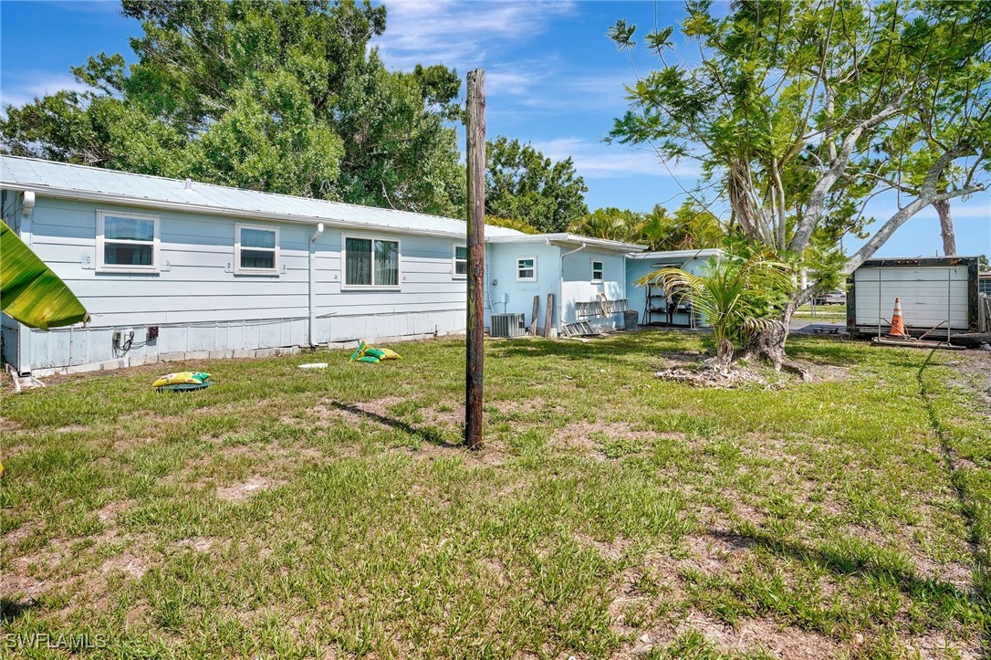2153 Twin Brooks Road North Fort Myers, FL 33917 - Photo 29 of 31 a view of a house with backyard