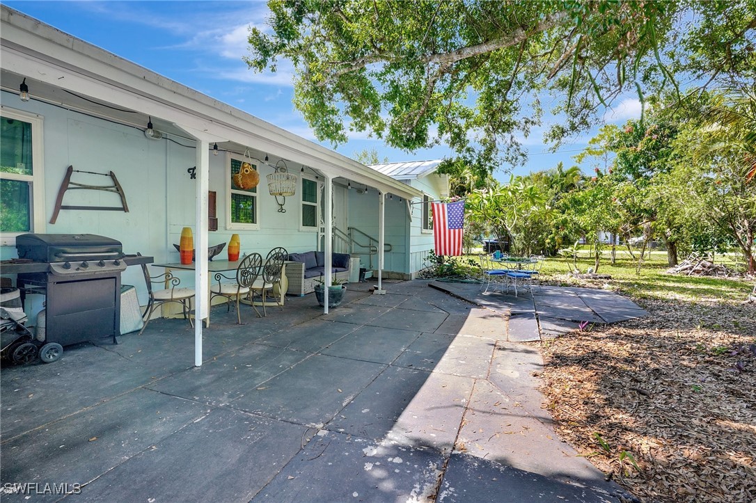 2153 Twin Brooks Road North Fort Myers, FL 33917 - Photo 3 of 31 a view of a house with backyard and sitting area