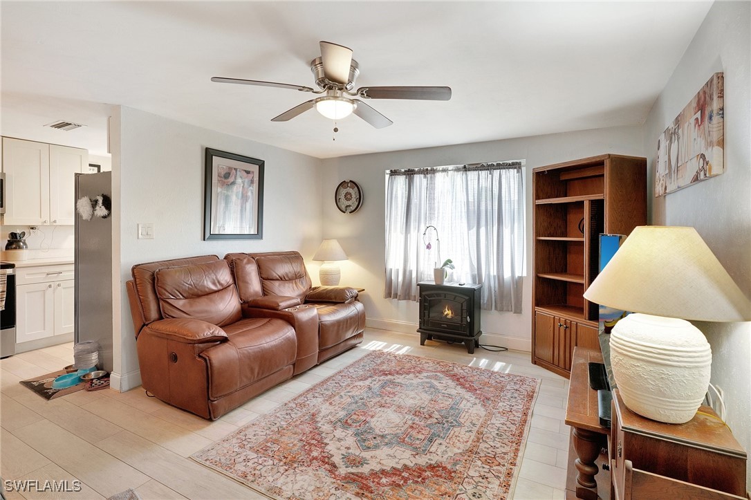 2153 Twin Brooks Road North Fort Myers, FL 33917 - Photo 6 of 31 a living room with furniture and a window