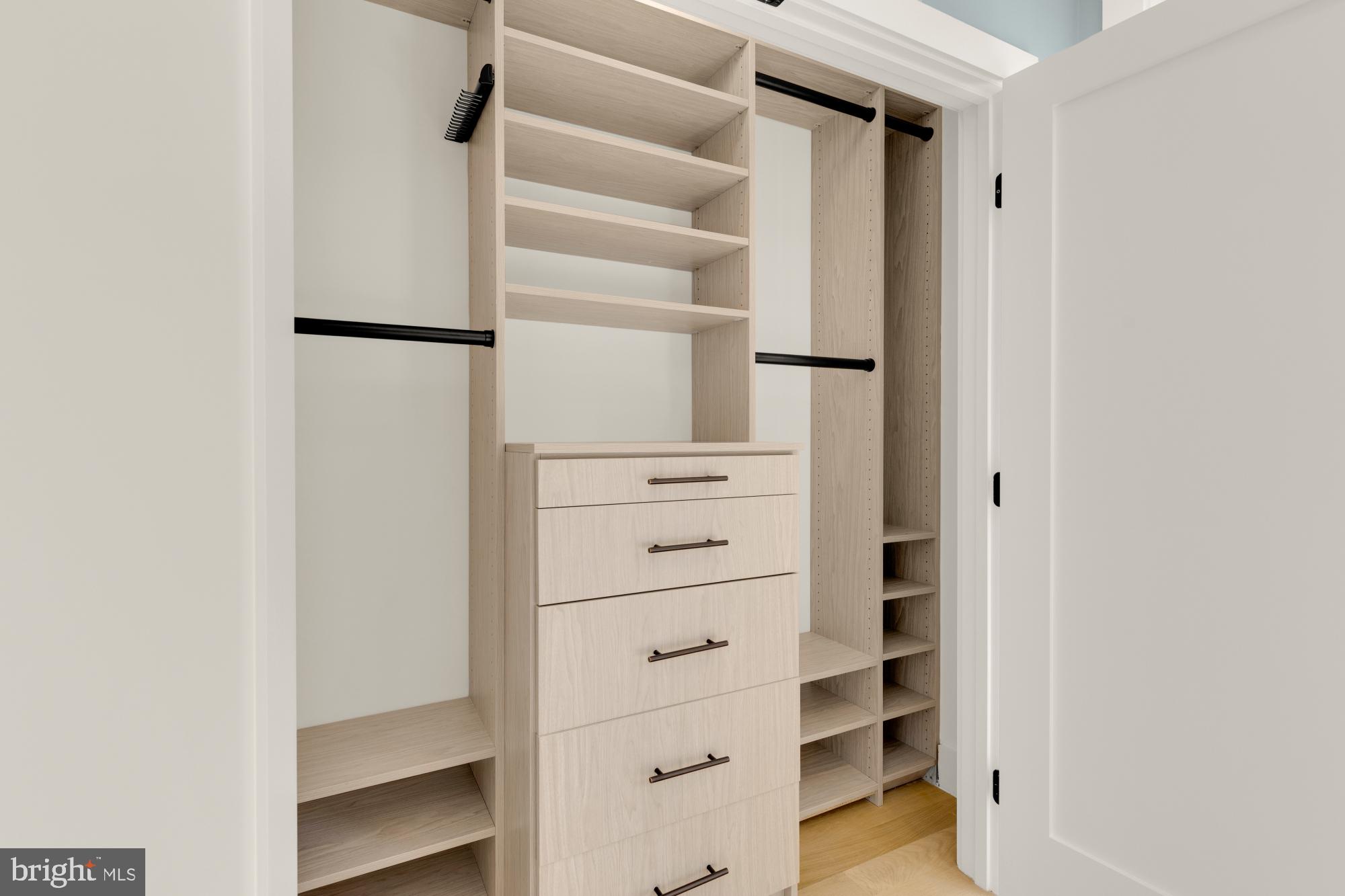 419 Independence Avenue Southeast Washington, DC 20003 - Photo 19 of 32 a view of walk in closet with empty racks
