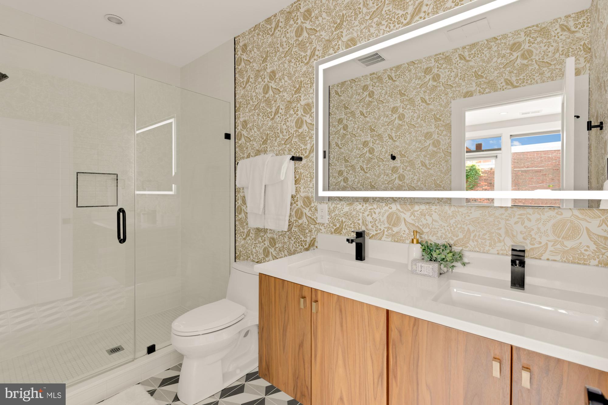 419 Independence Avenue Southeast Washington, DC 20003 - Photo 20 of 32 a bathroom with a sink a toilet and shower