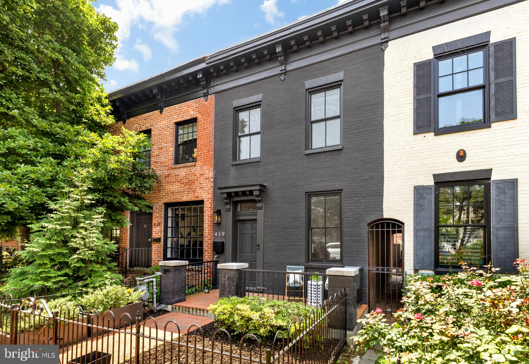 419 Independence Avenue Southeast Washington, DC 20003 - Photo 2 of 32 a front view of a house with outdoor seating