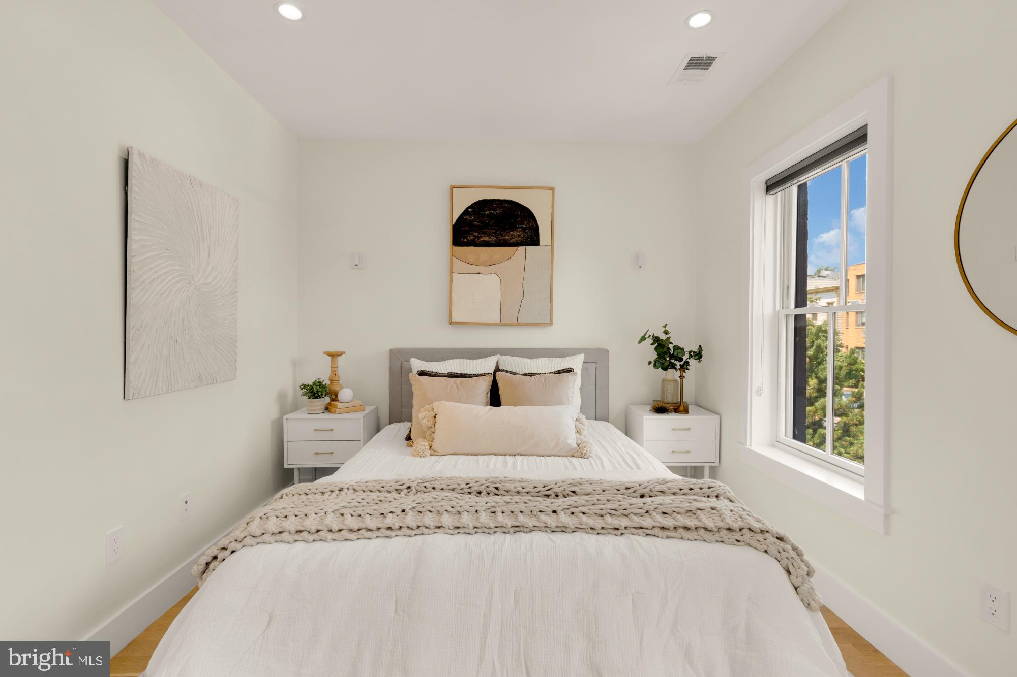 419 Independence Avenue Southeast Washington, DC 20003 - Photo 22 of 32 a bedroom with a bed and a window