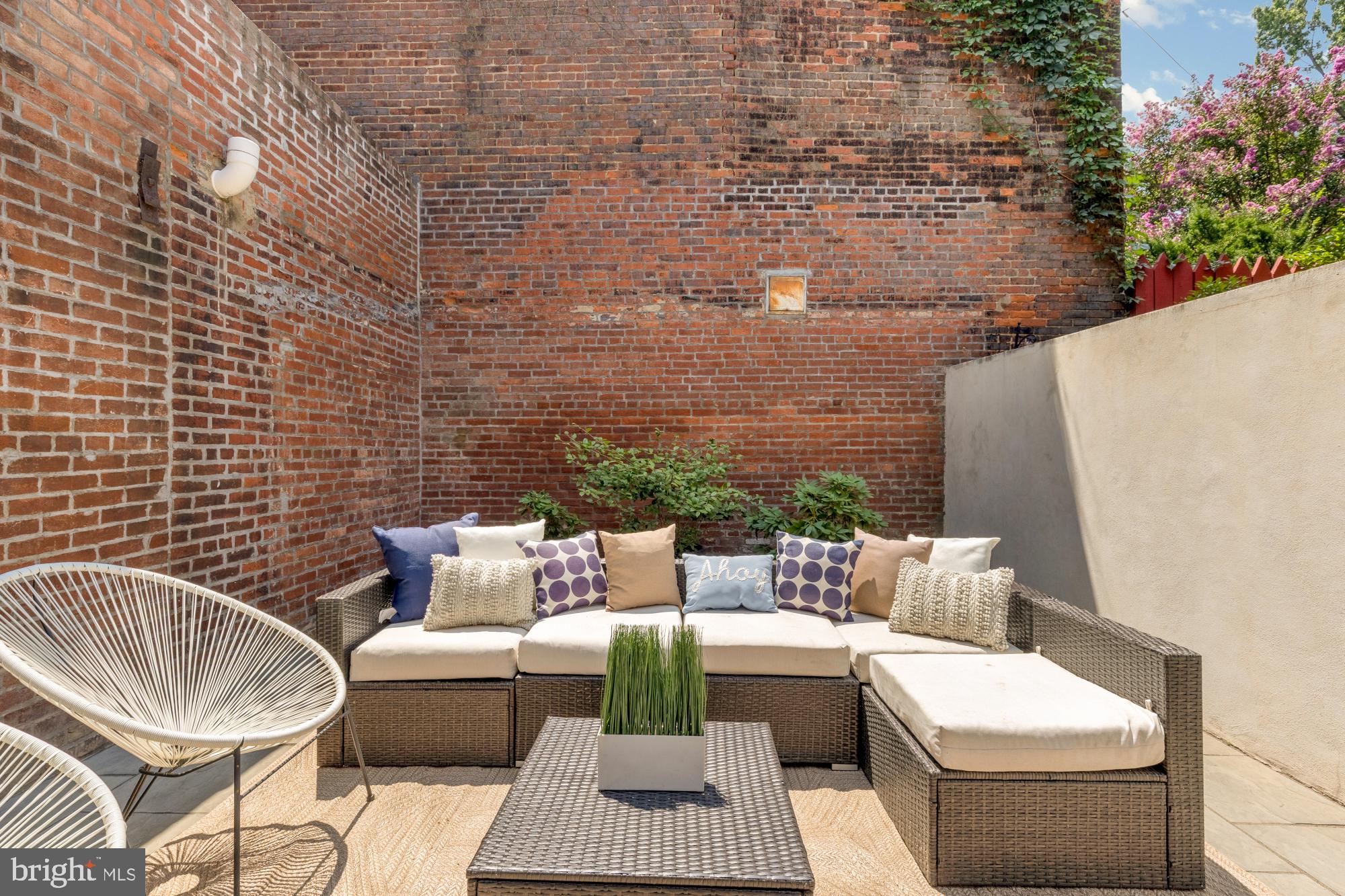 419 Independence Avenue Southeast Washington, DC 20003 - Photo 30 of 32 a outdoor living room with patio furniture and a potted plant