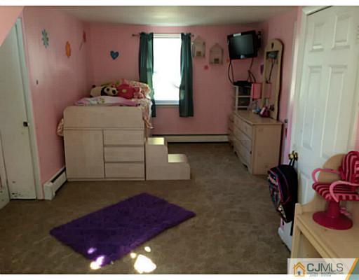 128 Raritan Boulevard Old Bridge, NJ 07735 - Photo 12 of 15 a room with storage and utility