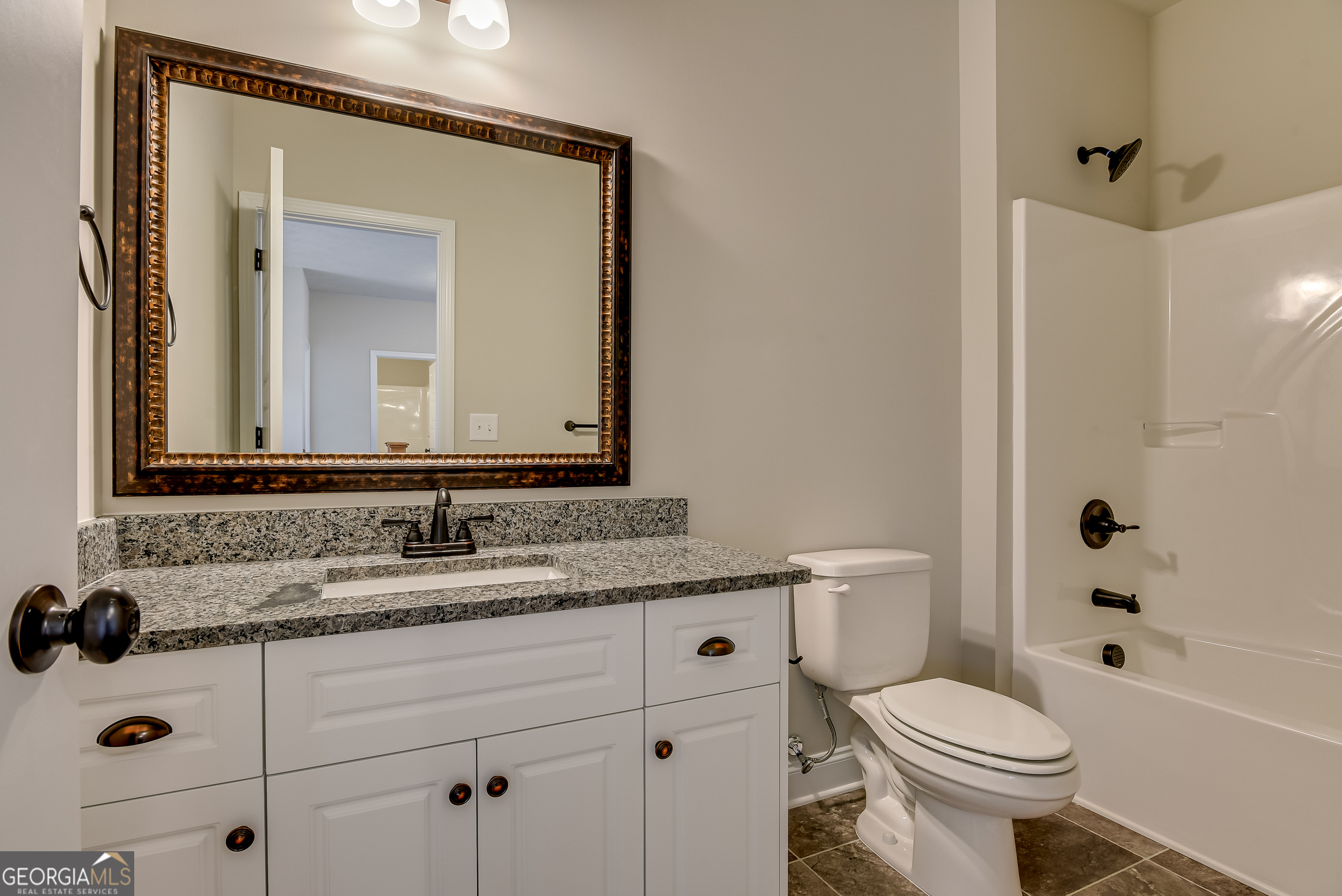 0 Peach Lane Edgefield, SC 29824 - Photo 10 of 14 a bathroom with a sink a toilet a mirror and shower