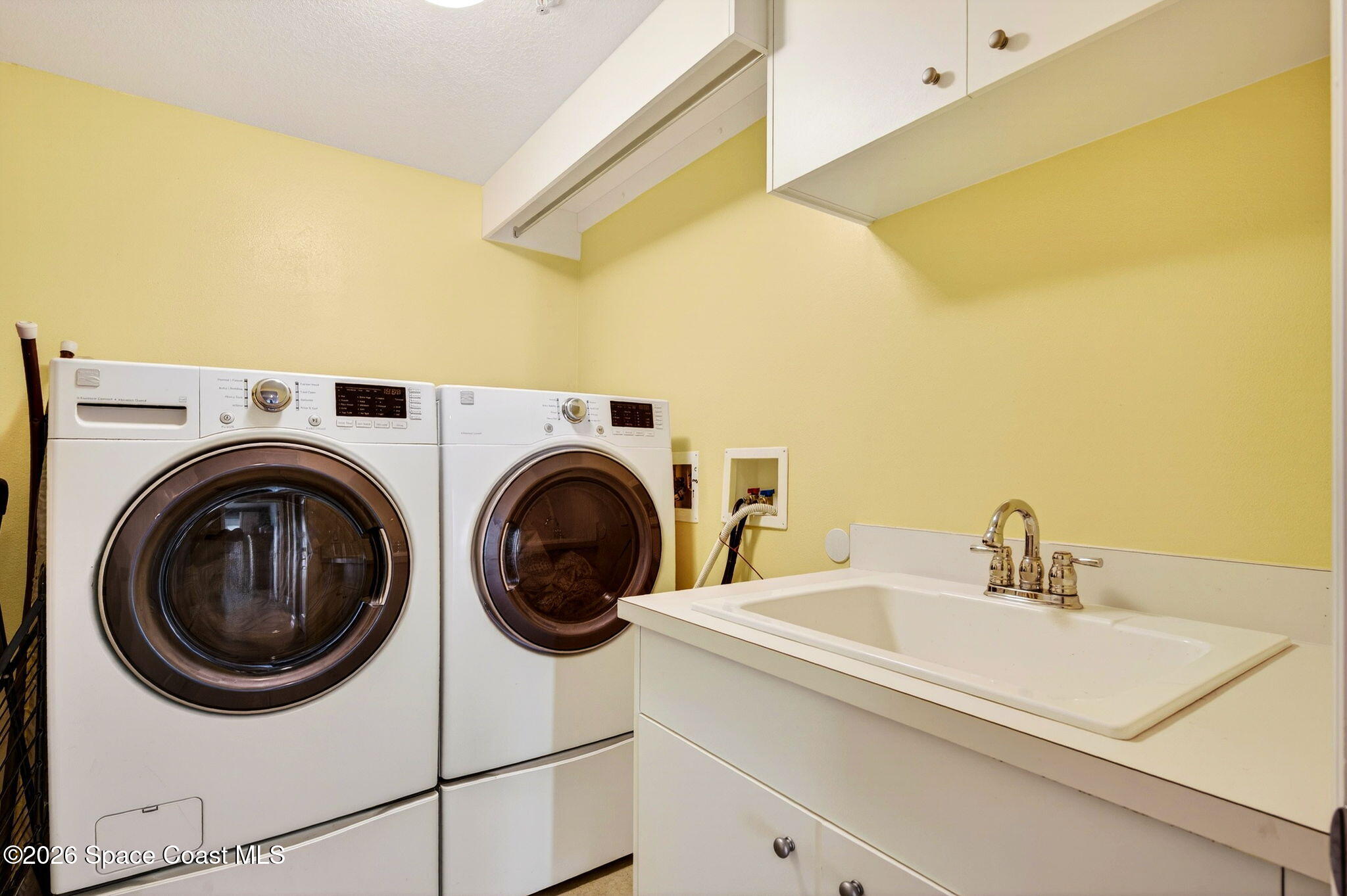 490 Sail Lane, Unit 301 Merritt Island, FL 32953 - Photo 37 of 53 Laundry Room With Sink