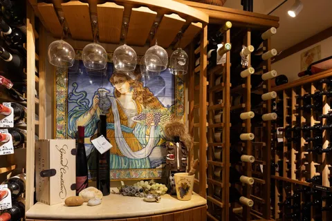 a view of a chair and table in backyard