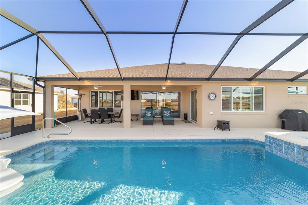 9681 Southwest 82nd Street Road Ocala, FL 34481 - Photo 41 of 62 a room with lots of table and chairs