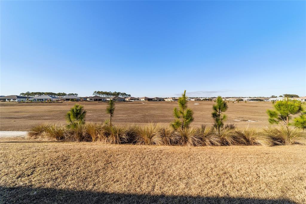 9681 Southwest 82nd Street Road Ocala, FL 34481 - Photo 44 of 62 a view of a lake with outdoor space
