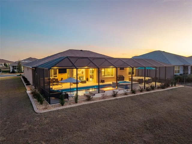 a view of a house with swimming pool