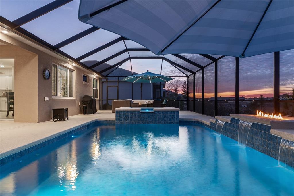 9681 Southwest 82nd Street Road Ocala, FL 34481 - Photo 48 of 62 a living room with furniture and a large window