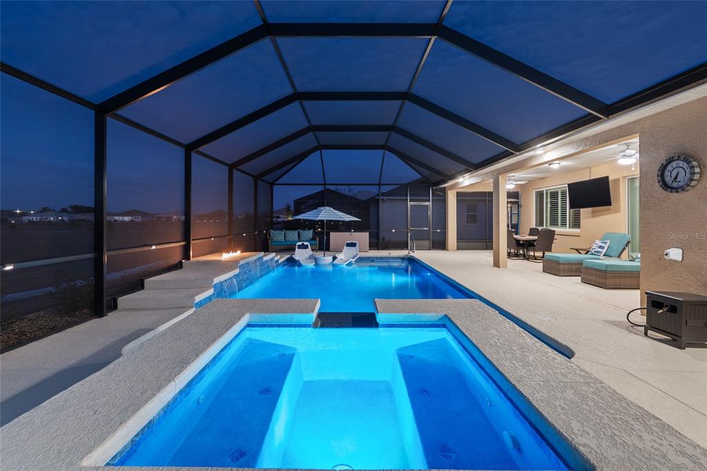 9681 Southwest 82nd Street Road Ocala, FL 34481 - Photo 51 of 62 a view of a backyard with sitting area