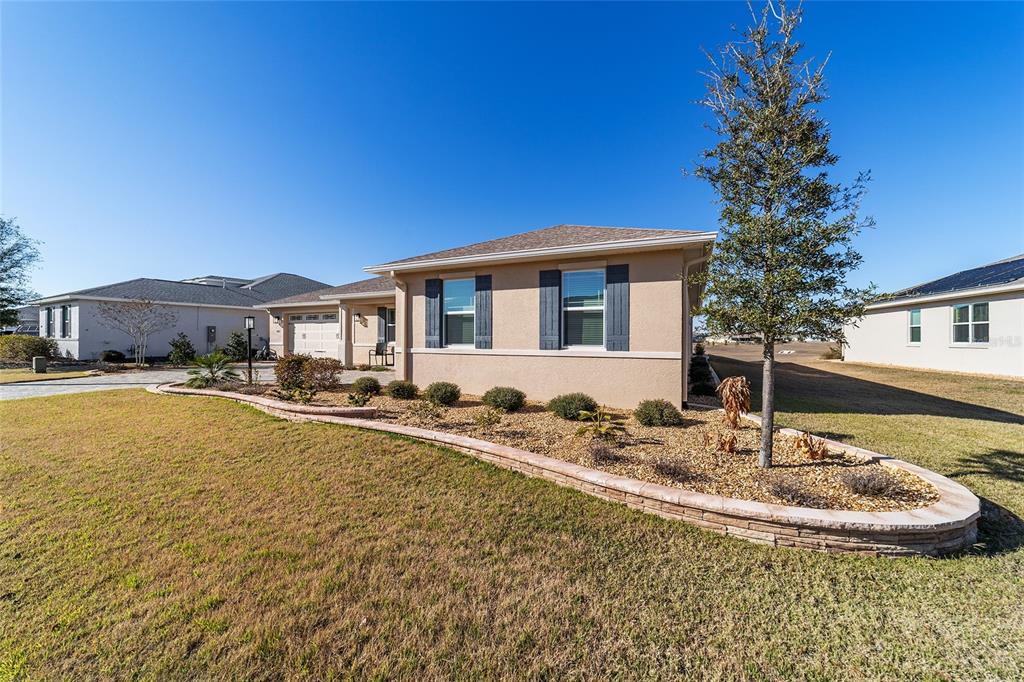 9681 Southwest 82nd Street Road Ocala, FL 34481 - Photo 56 of 62 a view of a house with swimming pool