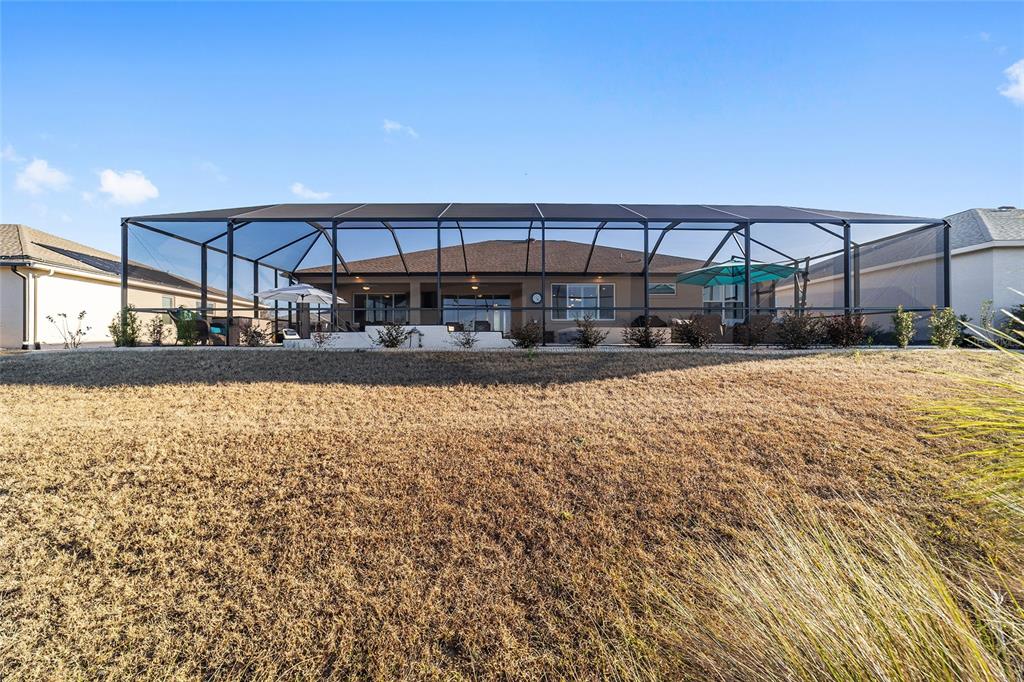 9681 Southwest 82nd Street Road Ocala, FL 34481 - Photo 59 of 62 a view of a swimming pool and an outdoor space