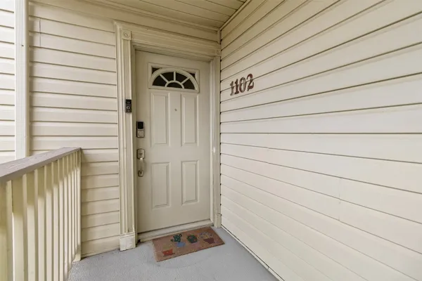 a view of front door and wooden door