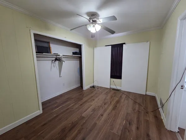 a view of a livingroom with a hardwood floor