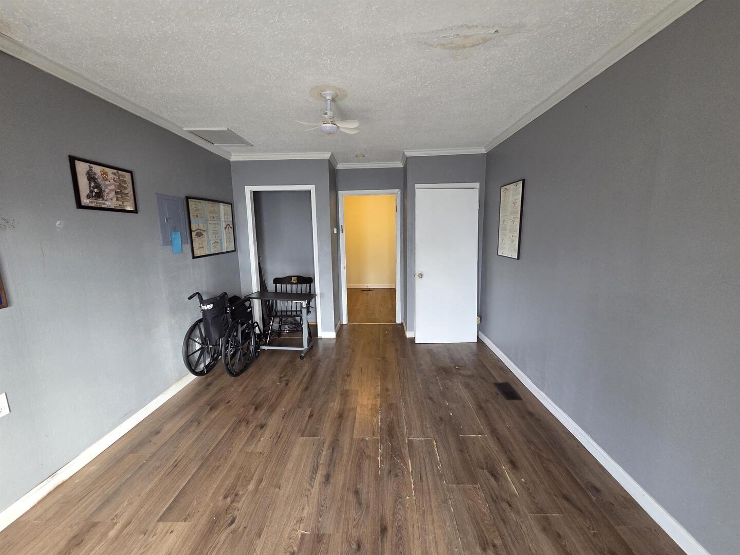 710 South Main Street Harrisburg, IL 62946 - Photo 15 of 18 a view of a room with wooden floor