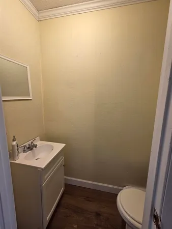 a bathroom with a sink and toilet