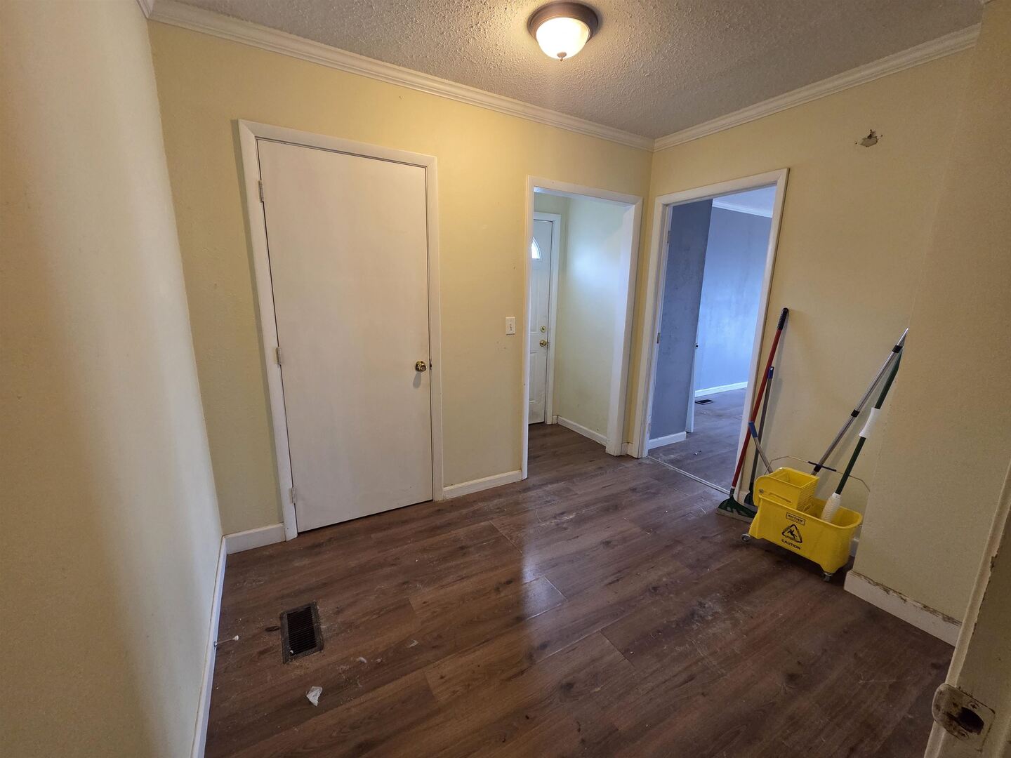 710 South Main Street Harrisburg, IL 62946 - Photo 18 of 18 an empty room with wooden floor and windows