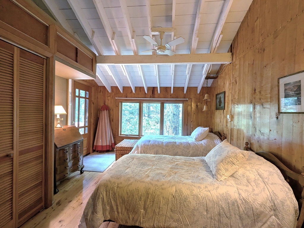 32 Pond Hill Road Goshen, MA 01096 - Photo 11 of 24 a bed sitting in a bedroom next to a window