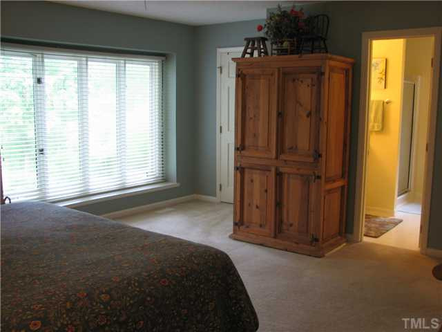 5108 Forest Creek Road Raleigh, NC 27606 - Photo 9 of 12 Master Bedroom
