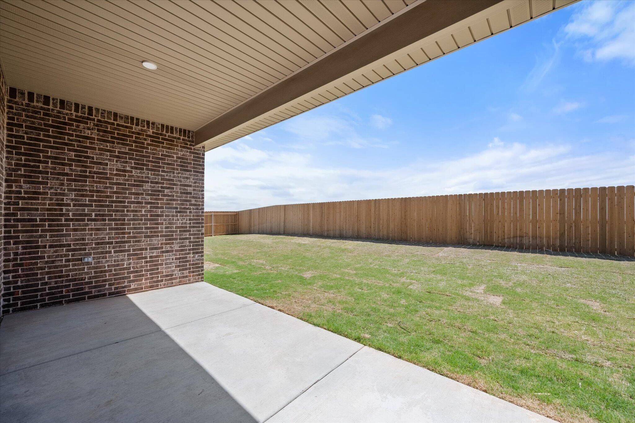 6101 121st Street Lubbock, TX 79424 - Photo 28 of 29 a view of a backyard