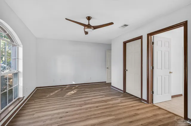 a bathroom with a sink vanity and a mirror