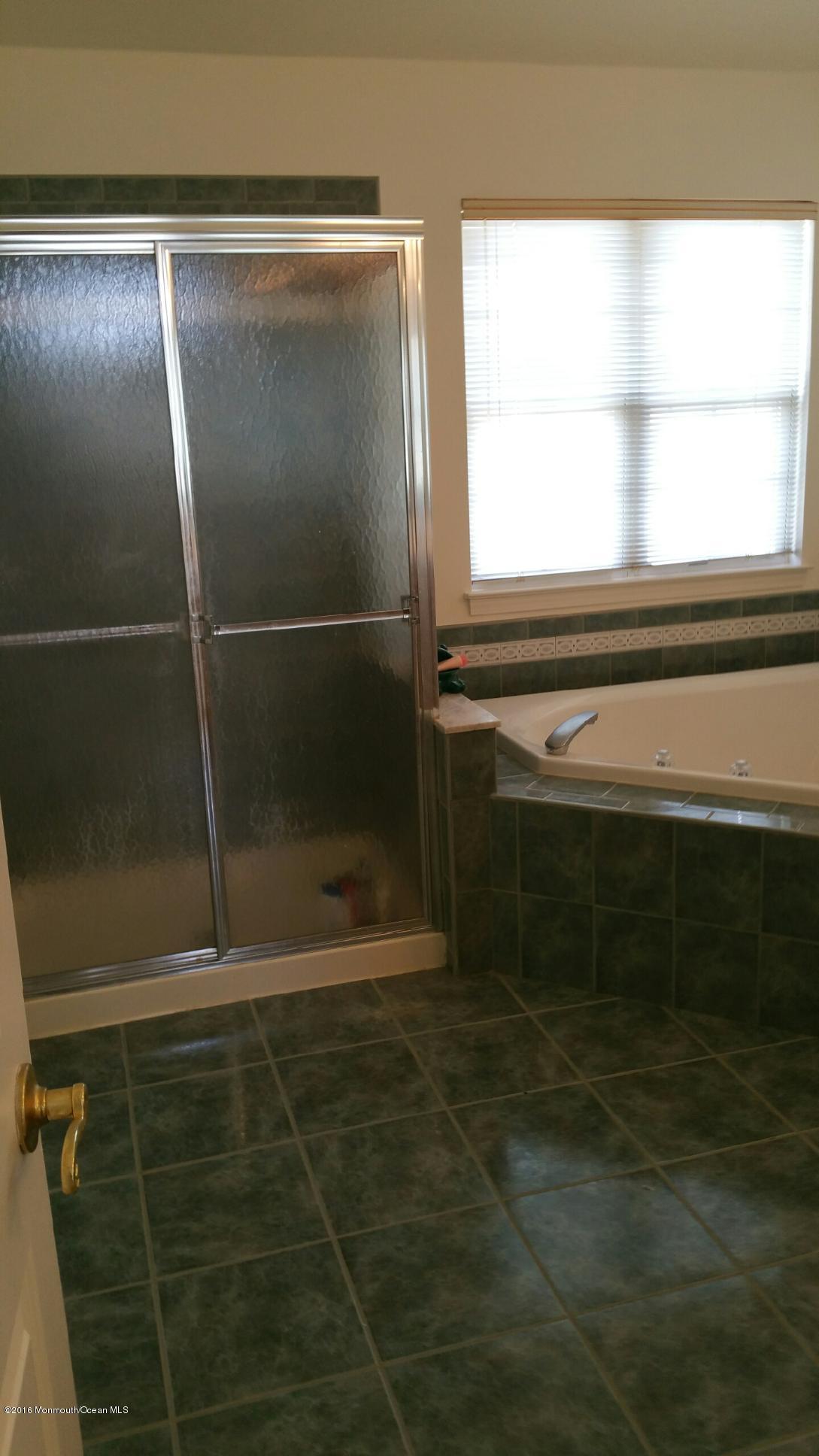 120 Bear Oak Road Freehold, NJ 07728 - Photo 8 of 9 a bathroom with a shower