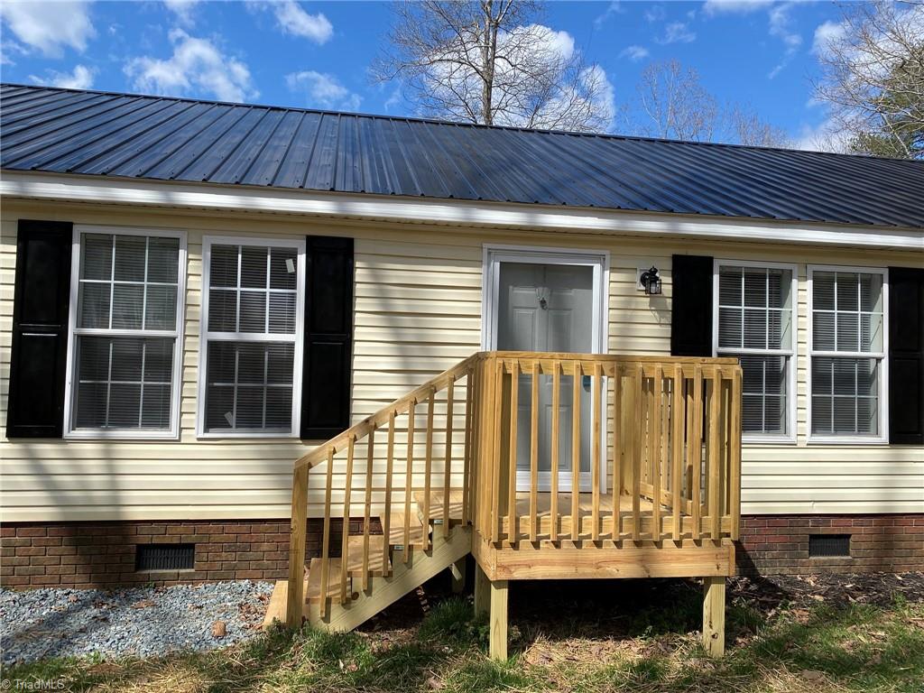 2781 Stewart Road Walnut Cove, NC 27052 - Photo 19 of 28 The steps are being moved to the front of the porch