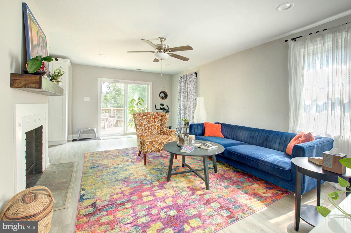 337 Hawarden Road Springfield, PA 19064 - Photo 11 of 21 Living room with sliders to the deck