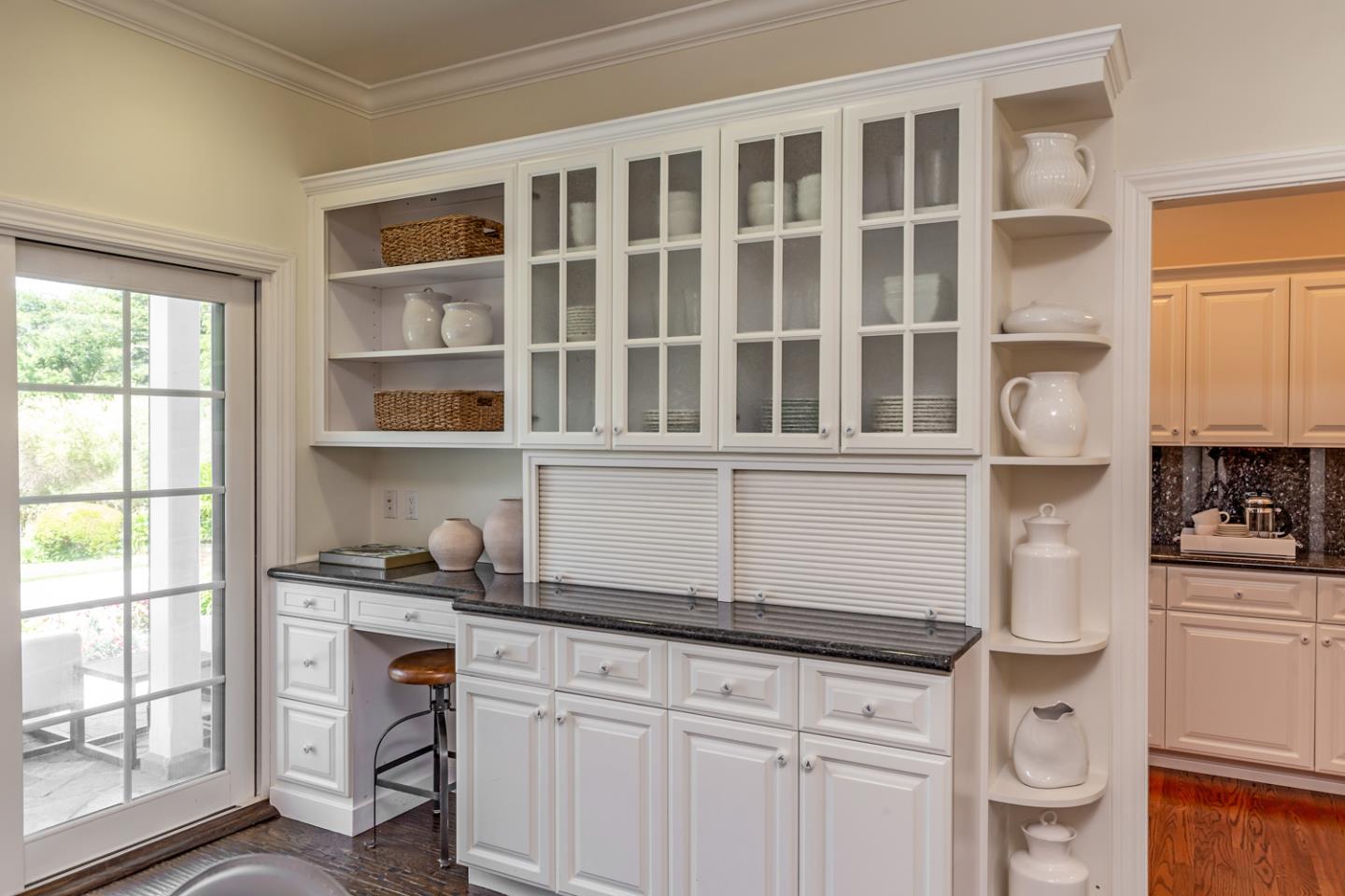 1210 Cañada Road Woodside, CA 94062 - Photo 12 of 60 a kitchen with a cabinets and window