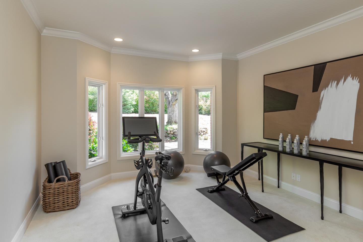 1210 Cañada Road Woodside, CA 94062 - Photo 19 of 60 a living room with furniture and a large window