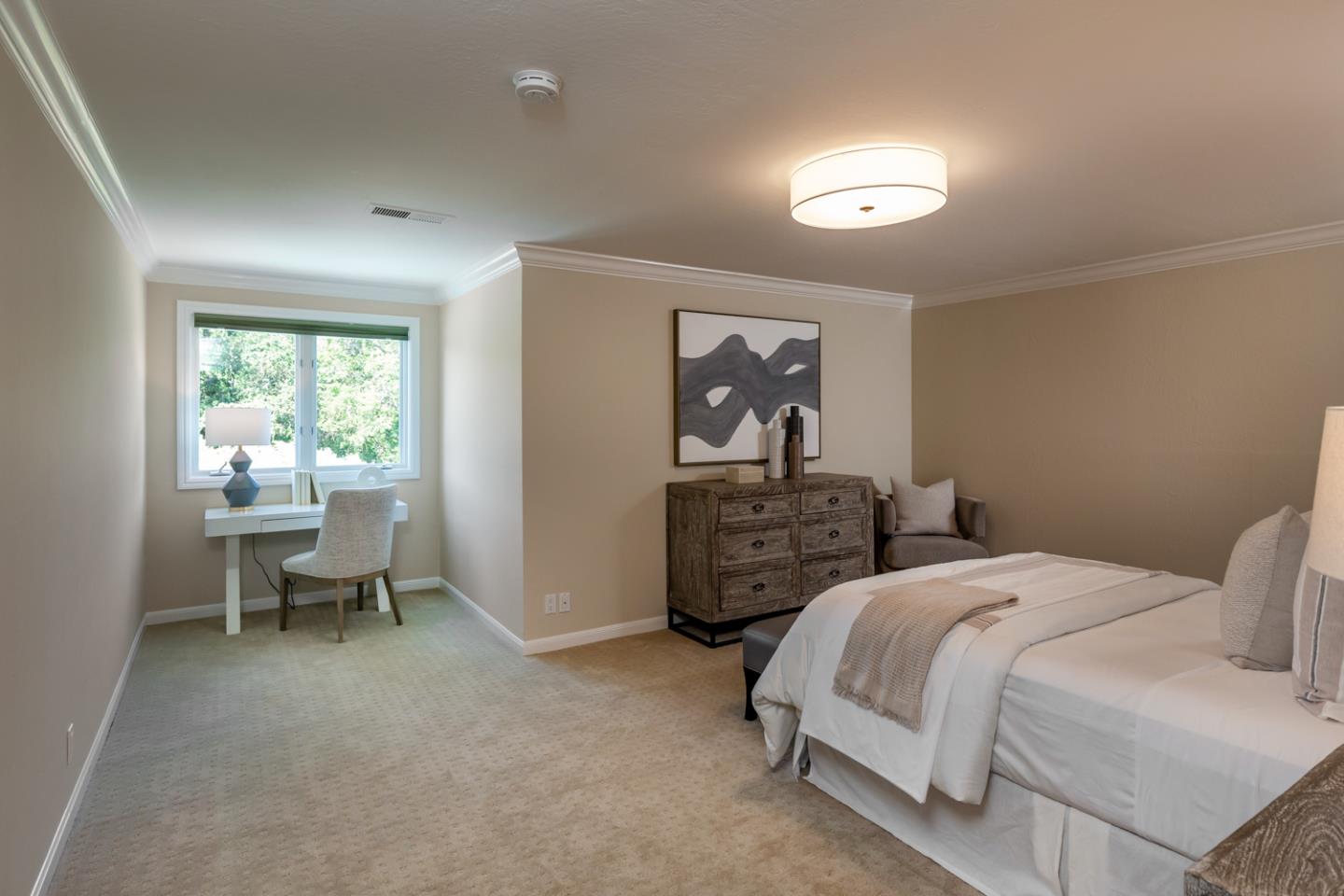 1210 Cañada Road Woodside, CA 94062 - Photo 28 of 60 a bedroom with a bed and a window