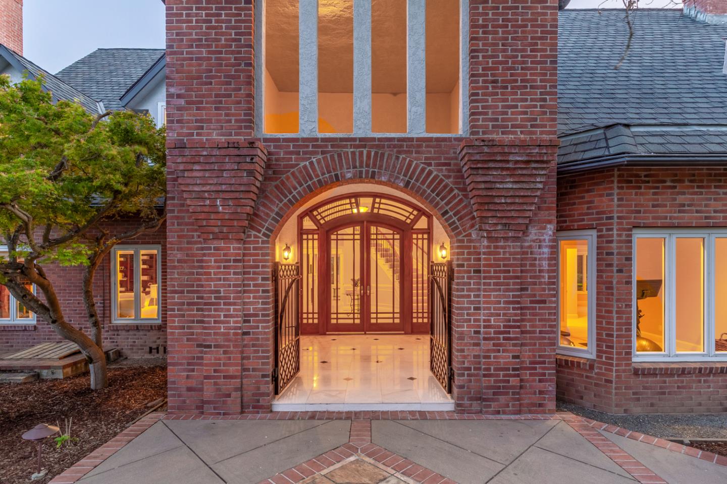 1210 Cañada Road Woodside, CA 94062 - Photo 4 of 60 a view of brick building with a door