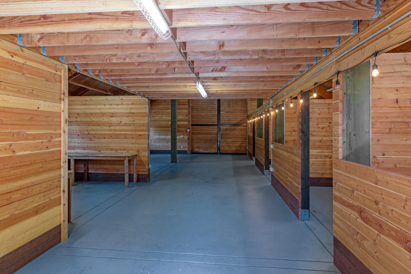 1210 Cañada Road Woodside, CA 94062 - Photo 48 of 60 a view of an empty room with a staircase