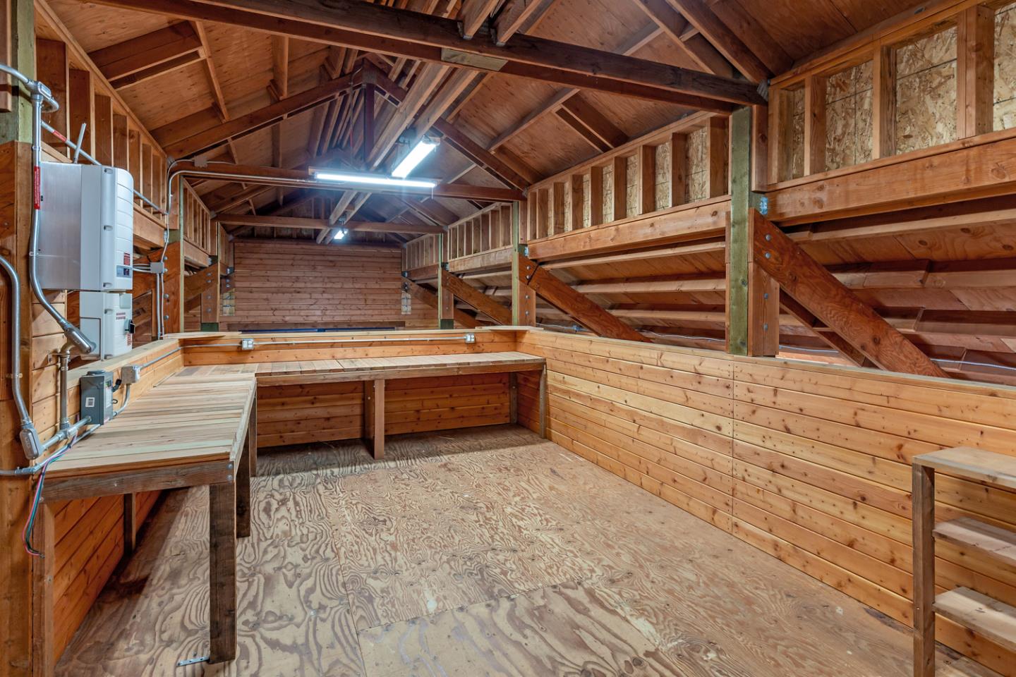 1210 Cañada Road Woodside, CA 94062 - Photo 49 of 60 a view of a room with racks on the wall