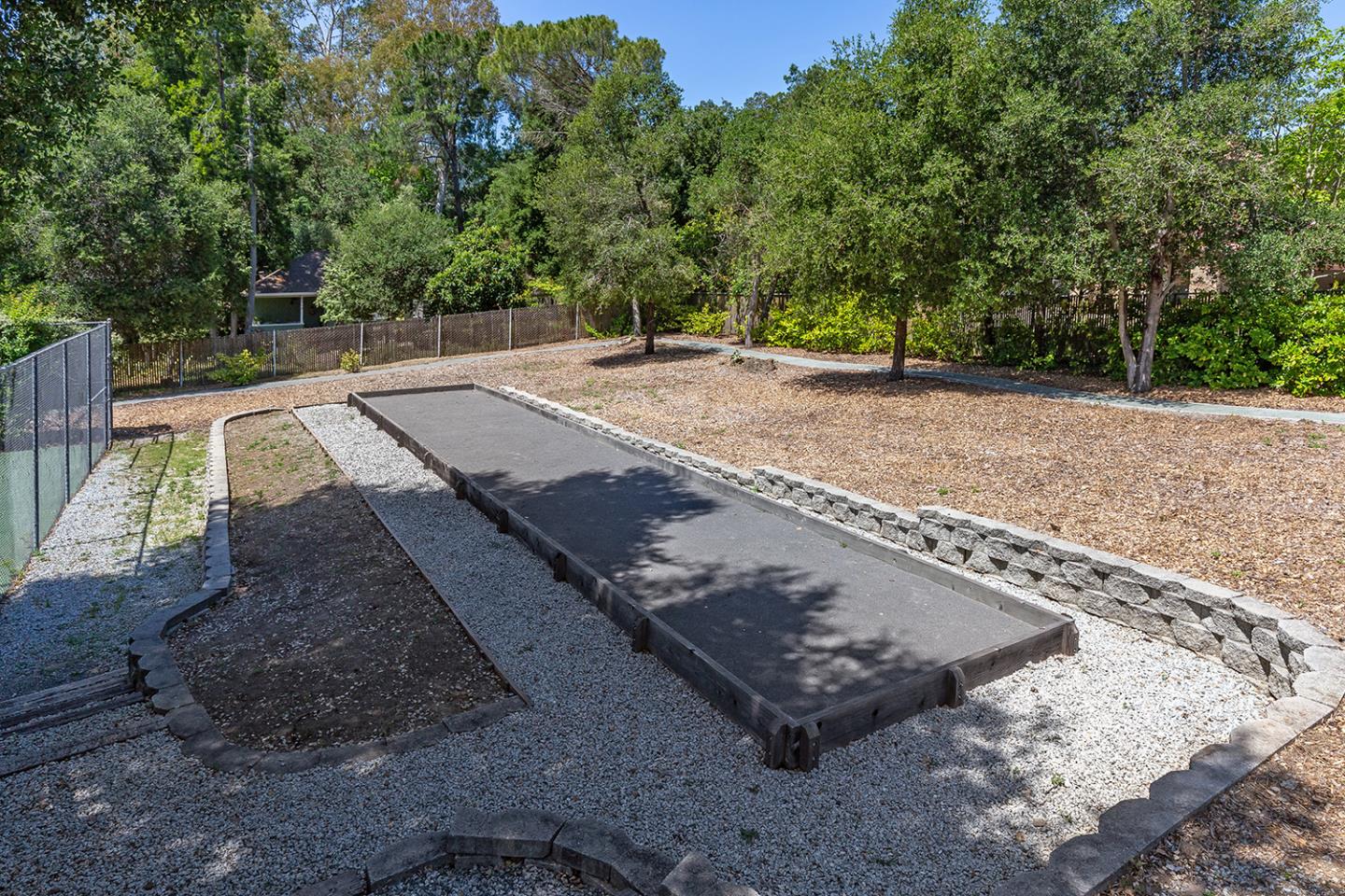 1210 Cañada Road Woodside, CA 94062 - Photo 53 of 60 a view of a backyard with trees