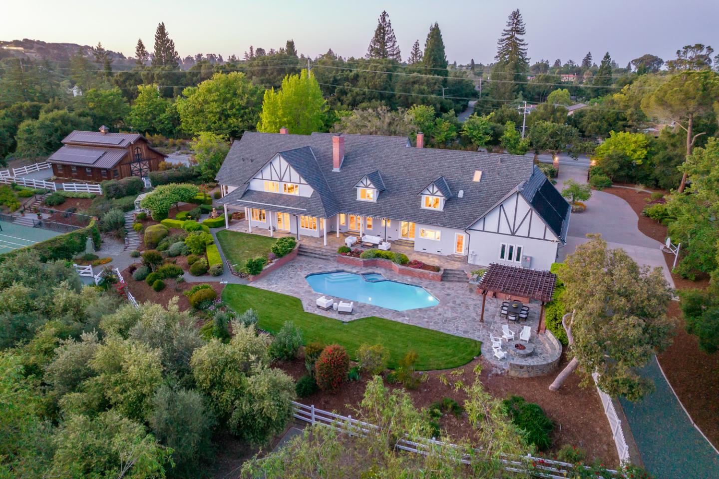 1210 Cañada Road Woodside, CA 94062 - Photo 55 of 60 an aerial view of a house with a garden