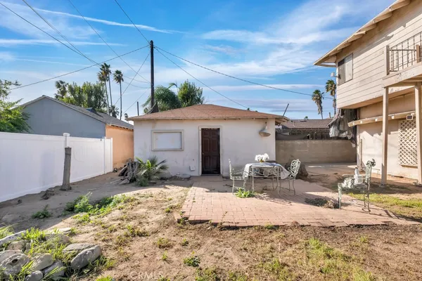 a front view of a house with a patio