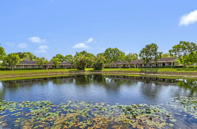 a house view with outdoor space and garden